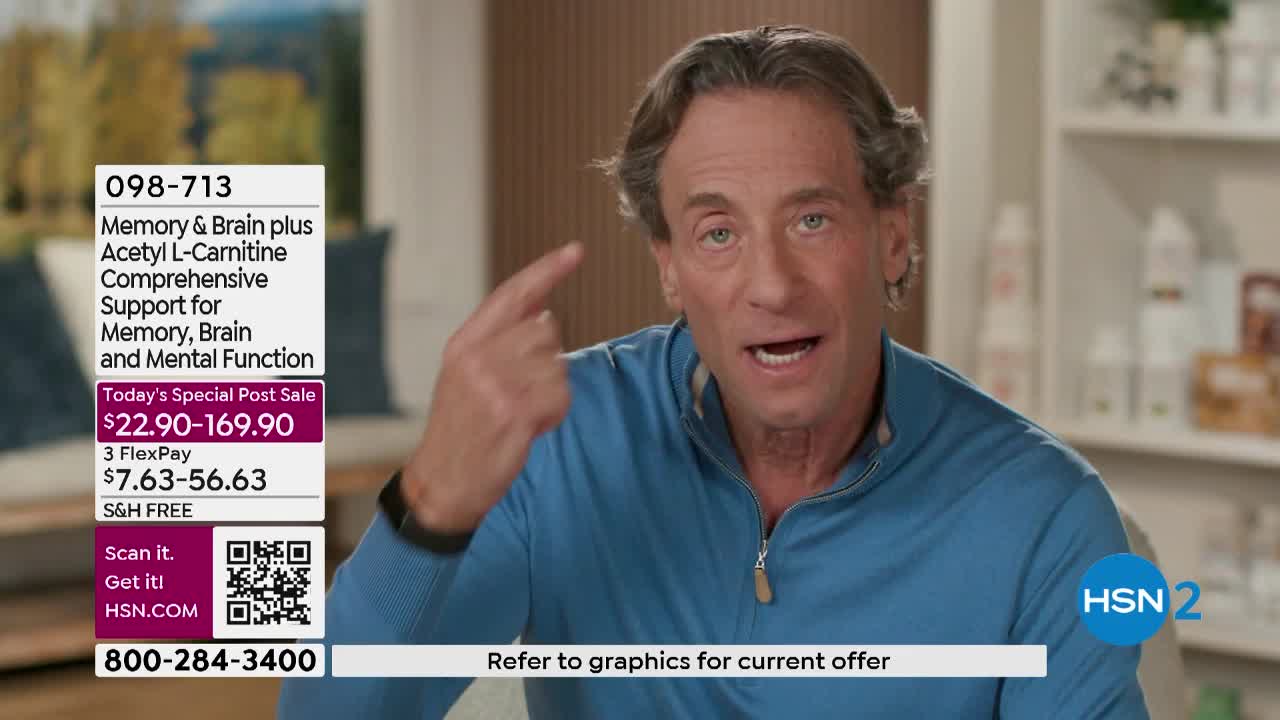 A man in a blue shirt gestures with his index finger while talking animatedly. The HSN2 logo is visible, and a product description is displayed on the left.
