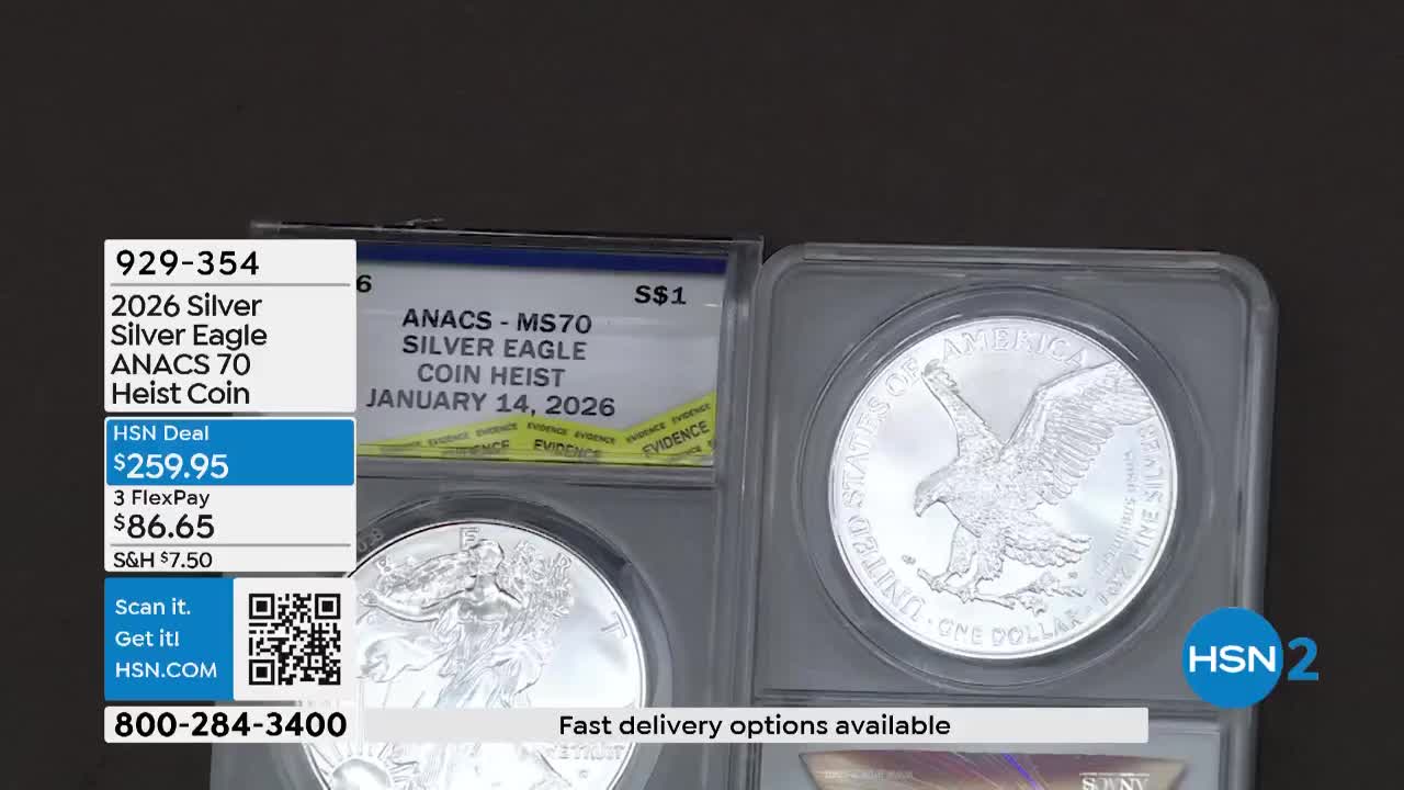 Two graded Silver Eagles rest in their protective cases. The coin on the right displays a proud eagle in flight, its details sharp and clear.