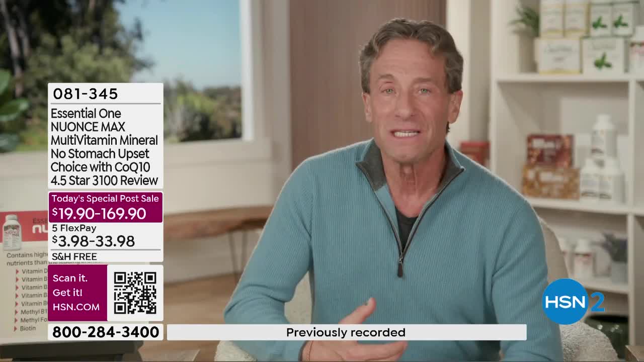 A man in a teal sweater is speaking directly to the camera. A graphic overlay displays product information and a phone number for HSN.