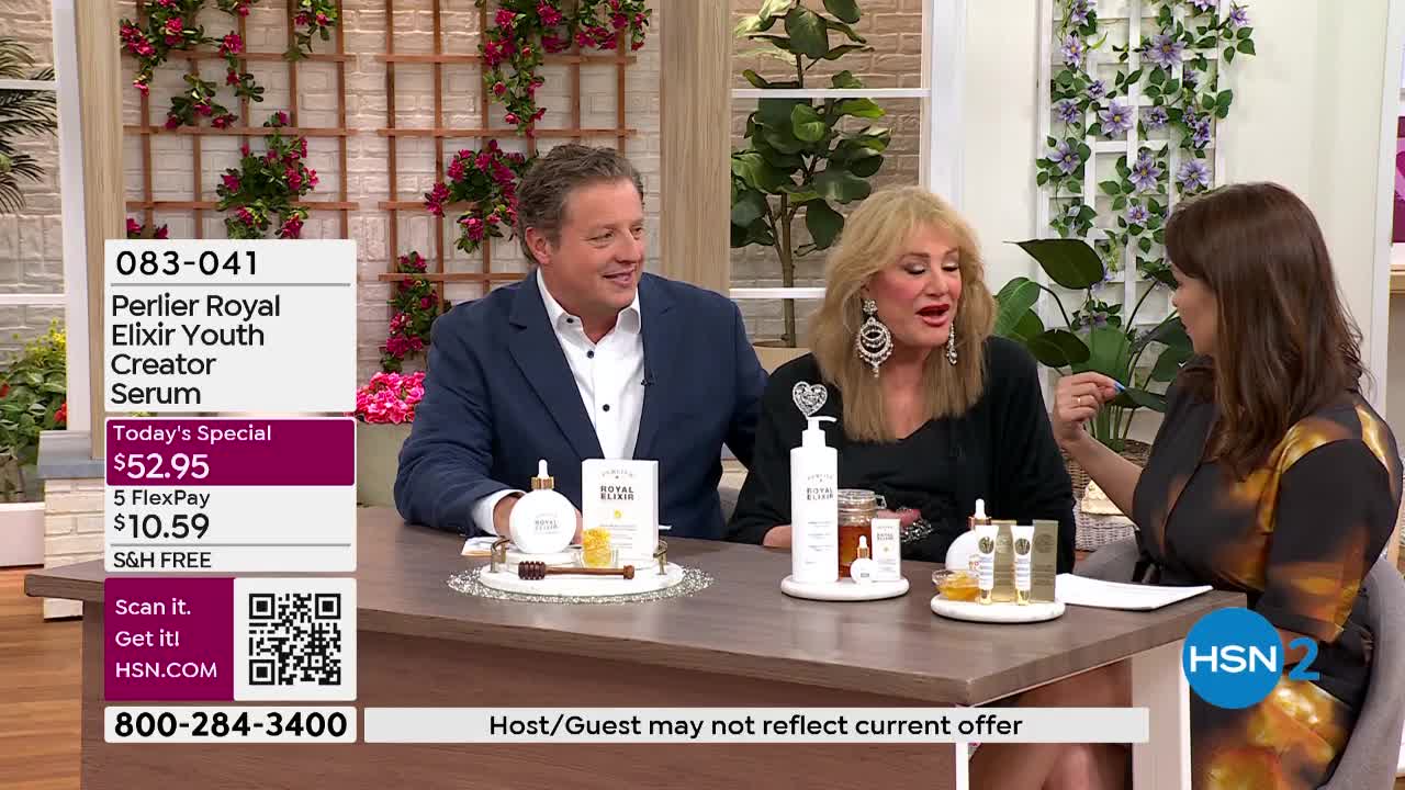 A man and two women are seated at a table, discussing products. The woman in the middle gestures animatedly as she speaks.