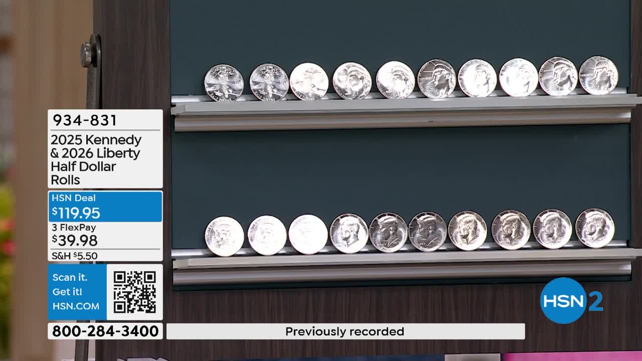 Rows of Kennedy and Liberty half dollars sit on display shelves. The coins are arranged neatly, showing the profiles of each president.