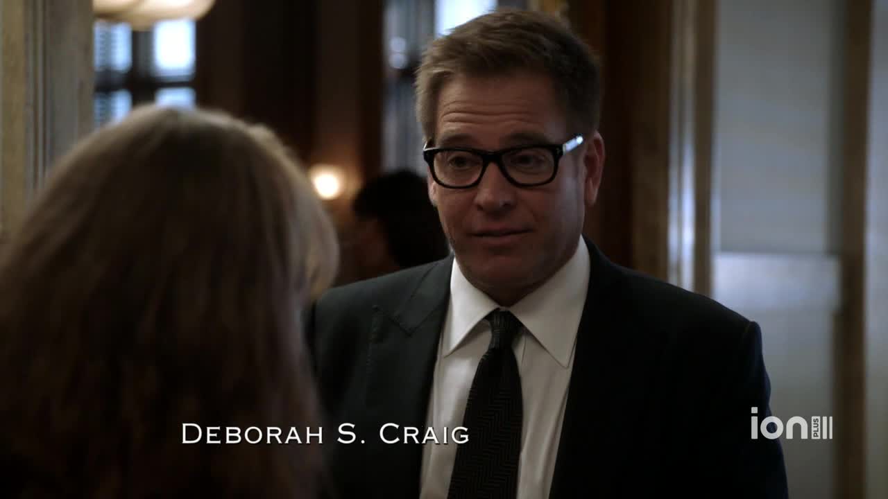 A man in a suit and glasses is talking to someone off-screen, a slight smile on his face. The ION Plus logo is visible in the corner, and Deborah S. Craig's name appears on the screen.
