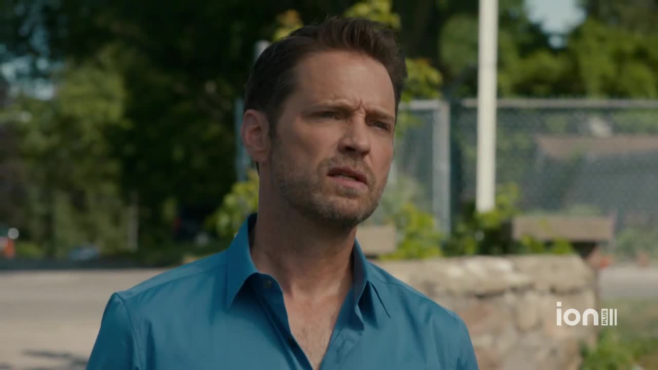 A man in a blue shirt looks off to the side with a concerned expression. The ION Plus logo is visible in the corner, suggesting a scene from a show.
