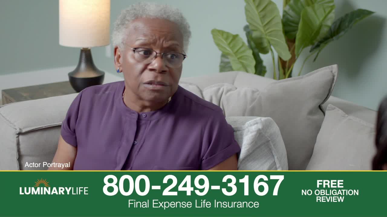 An older woman in a purple shirt sits on a couch, her expression concerned. Below, a green banner advertises final expense life insurance with a phone number.

