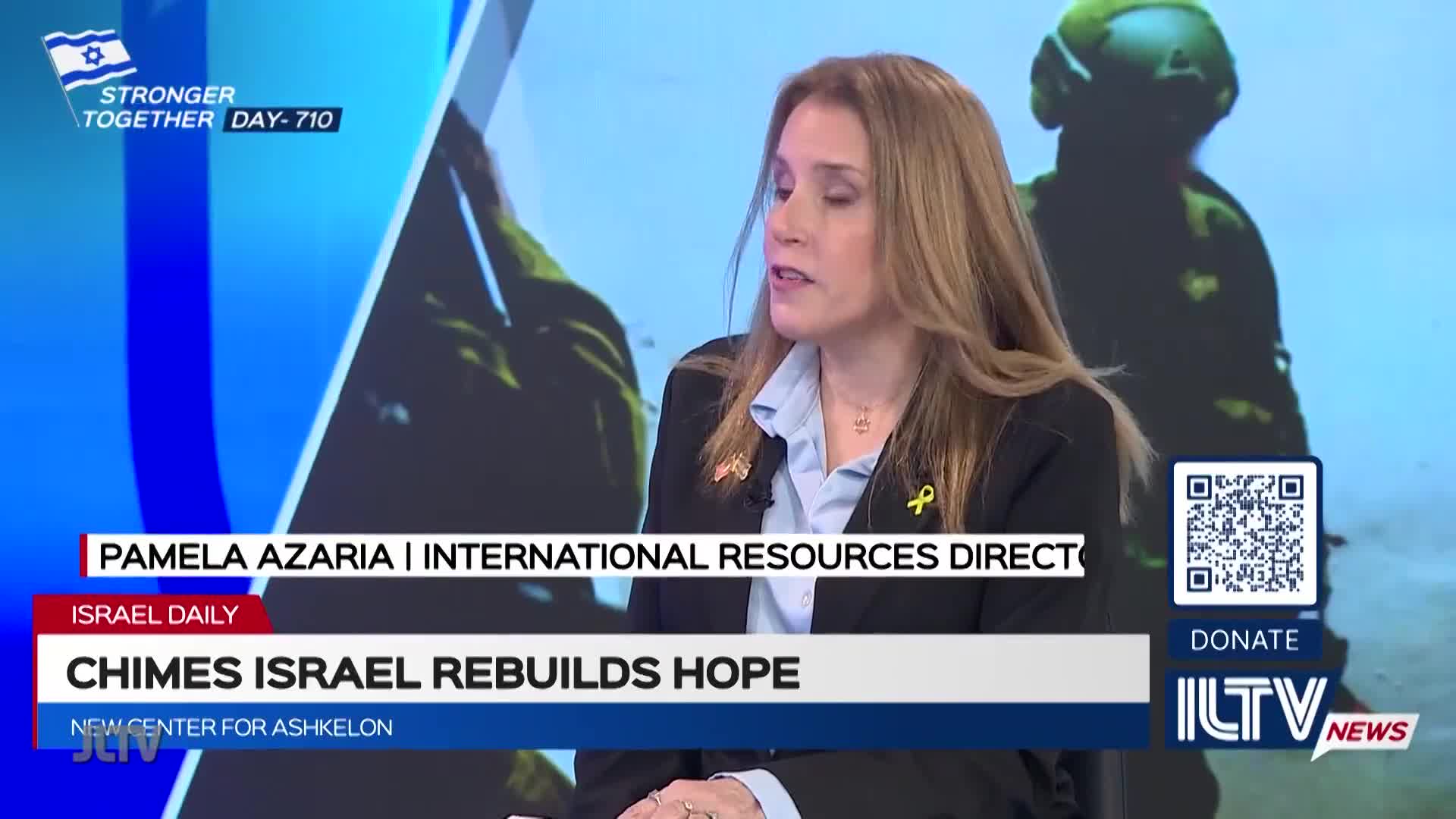 A woman in a blazer speaks, her expression earnest. The backdrop shows a figure in military gear, and a banner identifies the program as "Israel Daily" on ILTV News.
