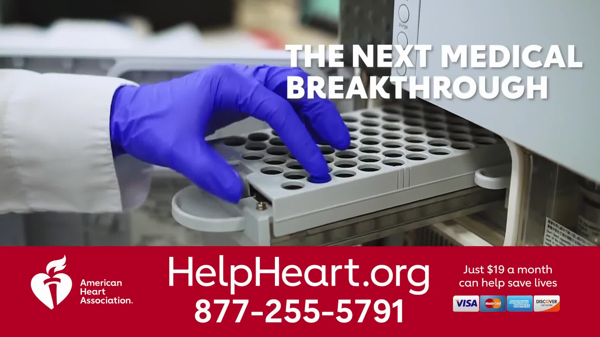 A gloved hand in blue gently places a small vial into a tray. The scene, likely part of an American Heart Association advertisement on Jewish Life Television, promises a medical breakthrough.
