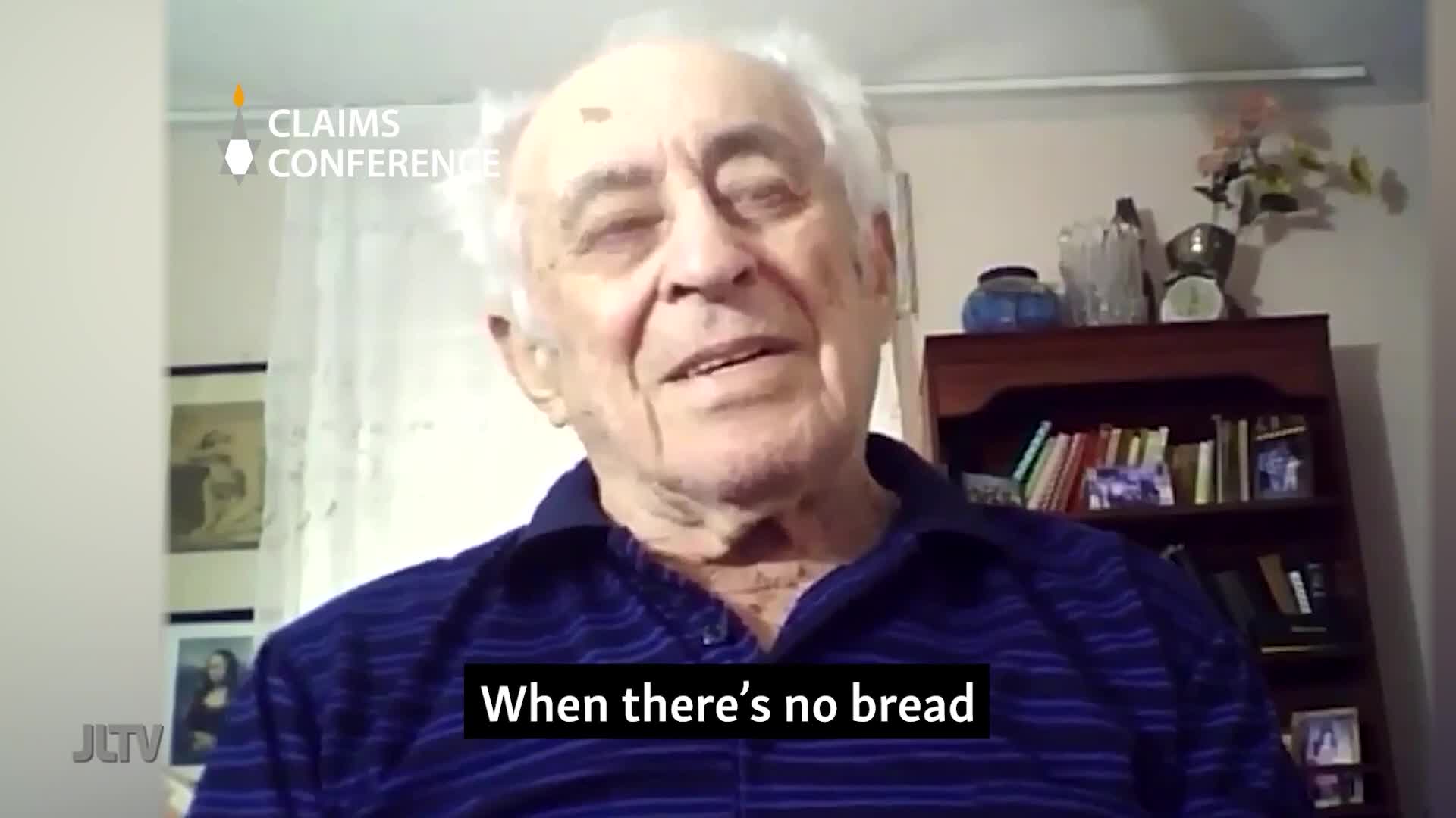 An older man with white hair speaks directly to the camera, his expression thoughtful. The JLTV logo appears in the lower left corner, and subtitles read "When there's no bread."