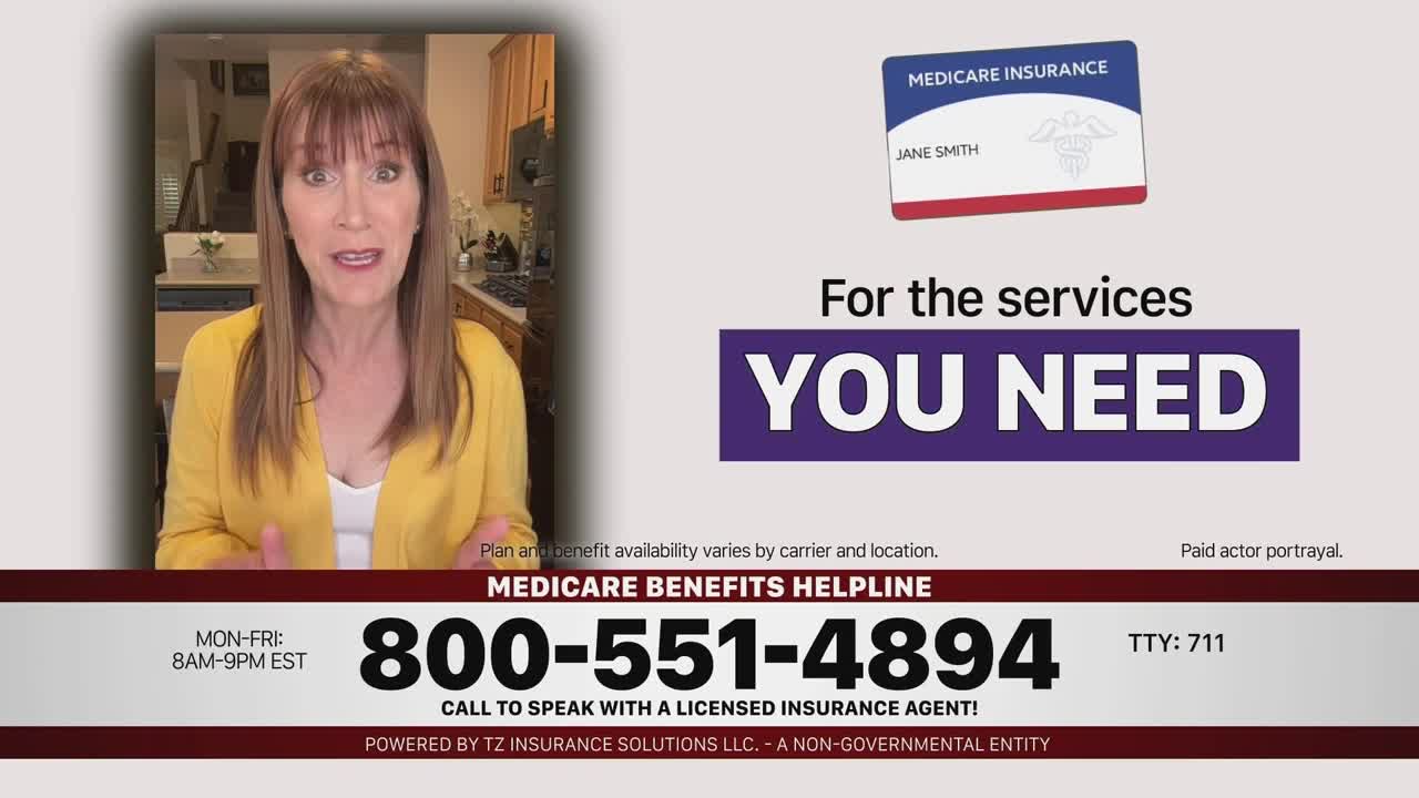 A woman in a yellow cardigan is talking directly at the camera, gesturing with her hands. Below, a phone number and a Medicare card graphic flash on screen, typical of a commercial on Lifetime Movies.
