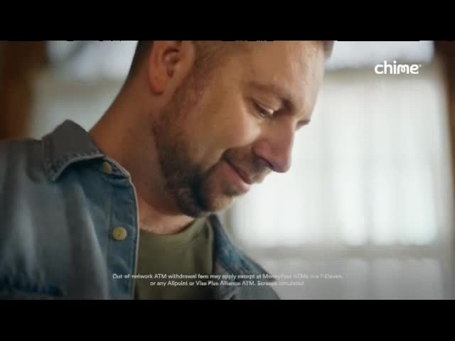 A man in a denim shirt looks down, a slight smile on his face. The "chime" logo is visible in the upper right corner, and text about ATM fees appears below.
