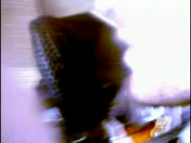 A dark shape, maybe a shoulder, moves in front of a bright light. The MTV Classic logo is visible in the lower right corner.
