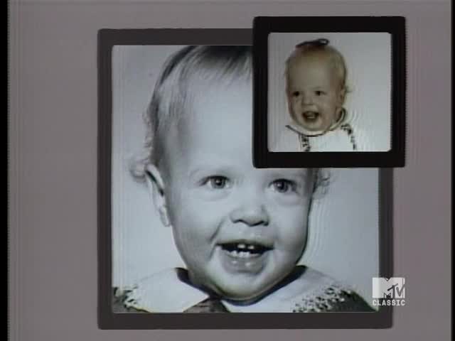 A large, smiling baby photo is framed, with a smaller picture of the same baby placed on top. The MTV Classic logo is visible in the corner.
