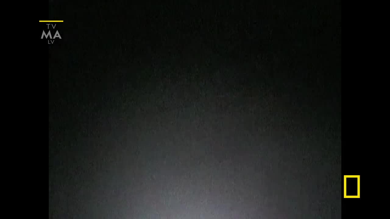 The screen is mostly dark, but the National Geographic logo is visible in the corner. The TV rating is in the upper left.
