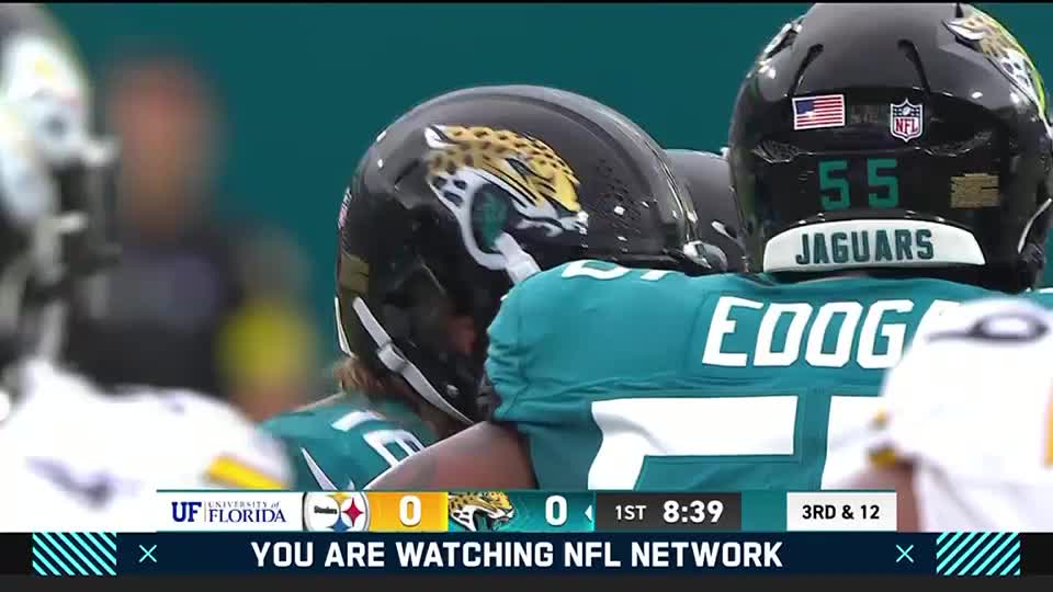 A Jacksonville Jaguars player, number 55, has his back to me, the American flag on his helmet. The score is tied, and the NFL Network graphic shows the game is in the first quarter.
