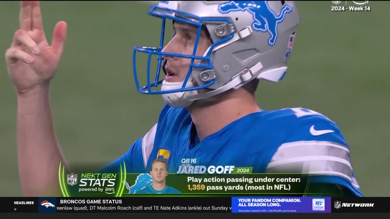 Jared Goff, in his Lions uniform, raises his hand, fingers extended, as the NFL Network graphic highlights his passing stats. The screen displays "Next Gen Stats" powered by AWS, along with the Broncos game status.
