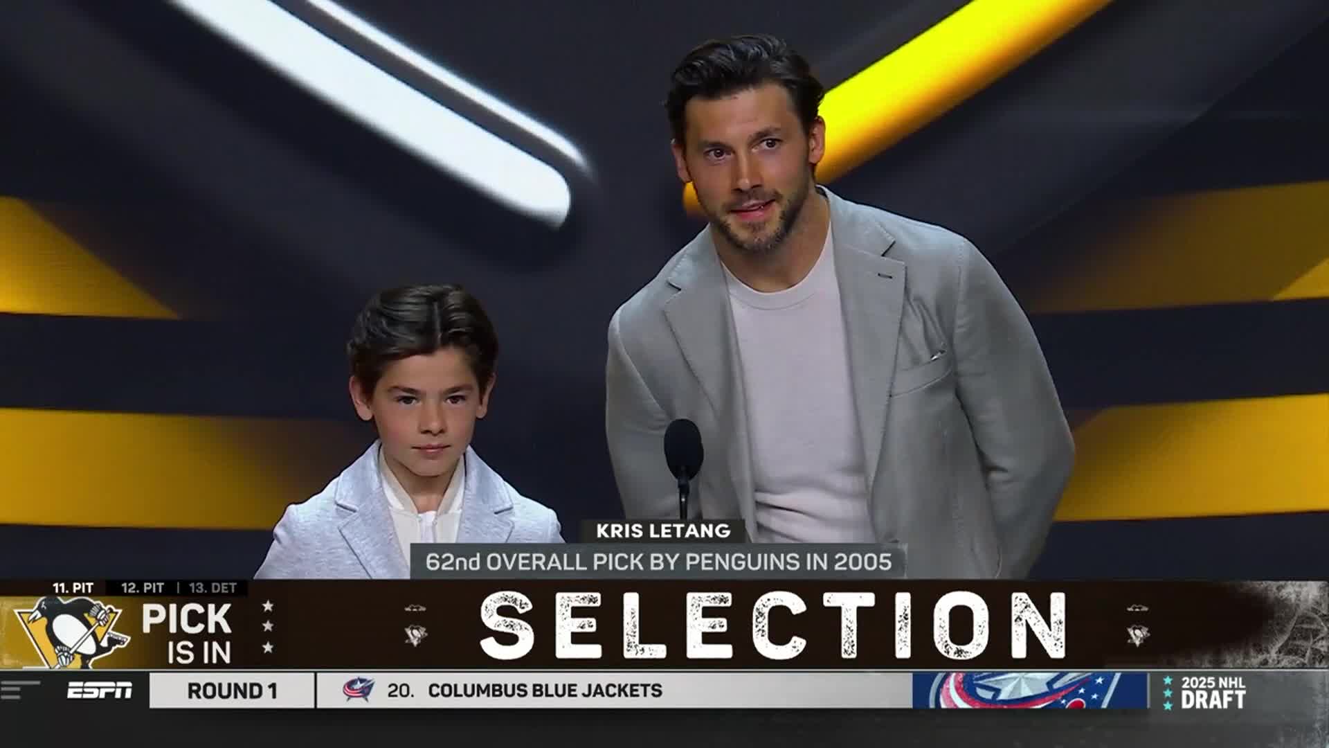 A man and a boy, both in light-colored jackets, stand near a microphone. The NHL Network graphic at the bottom says "Selection" and mentions the Pittsburgh Penguins.
