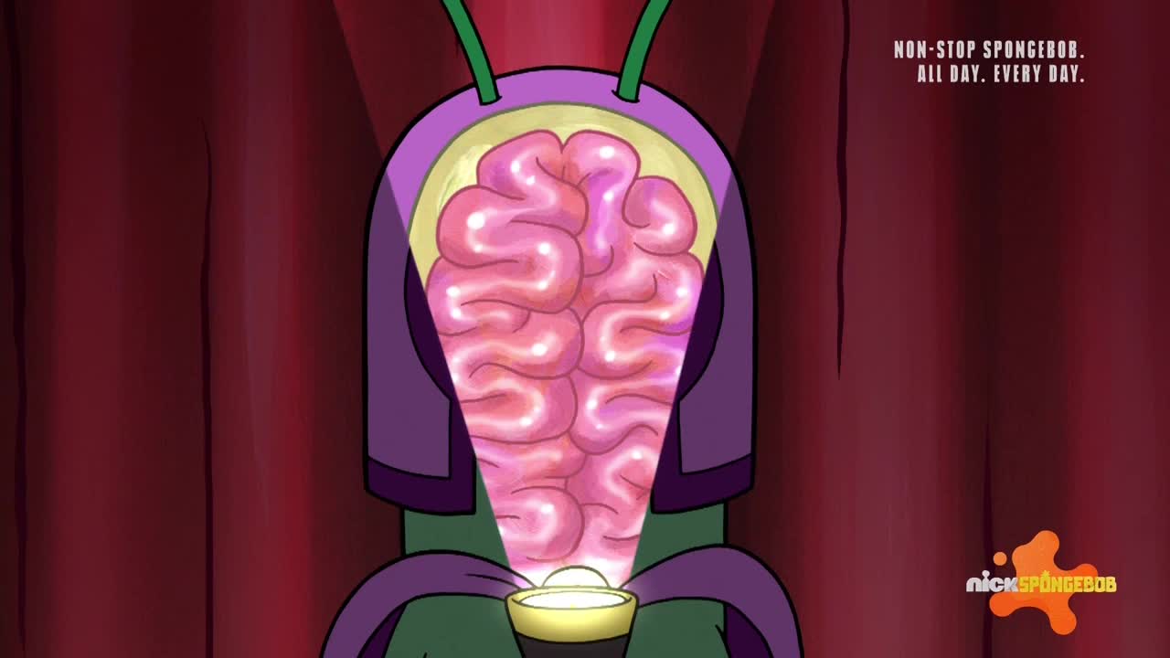 A cartoonish alien, lit from below, has a bright pink brain exposed. The brain is the focus, a glowing, wrinkled mass.
