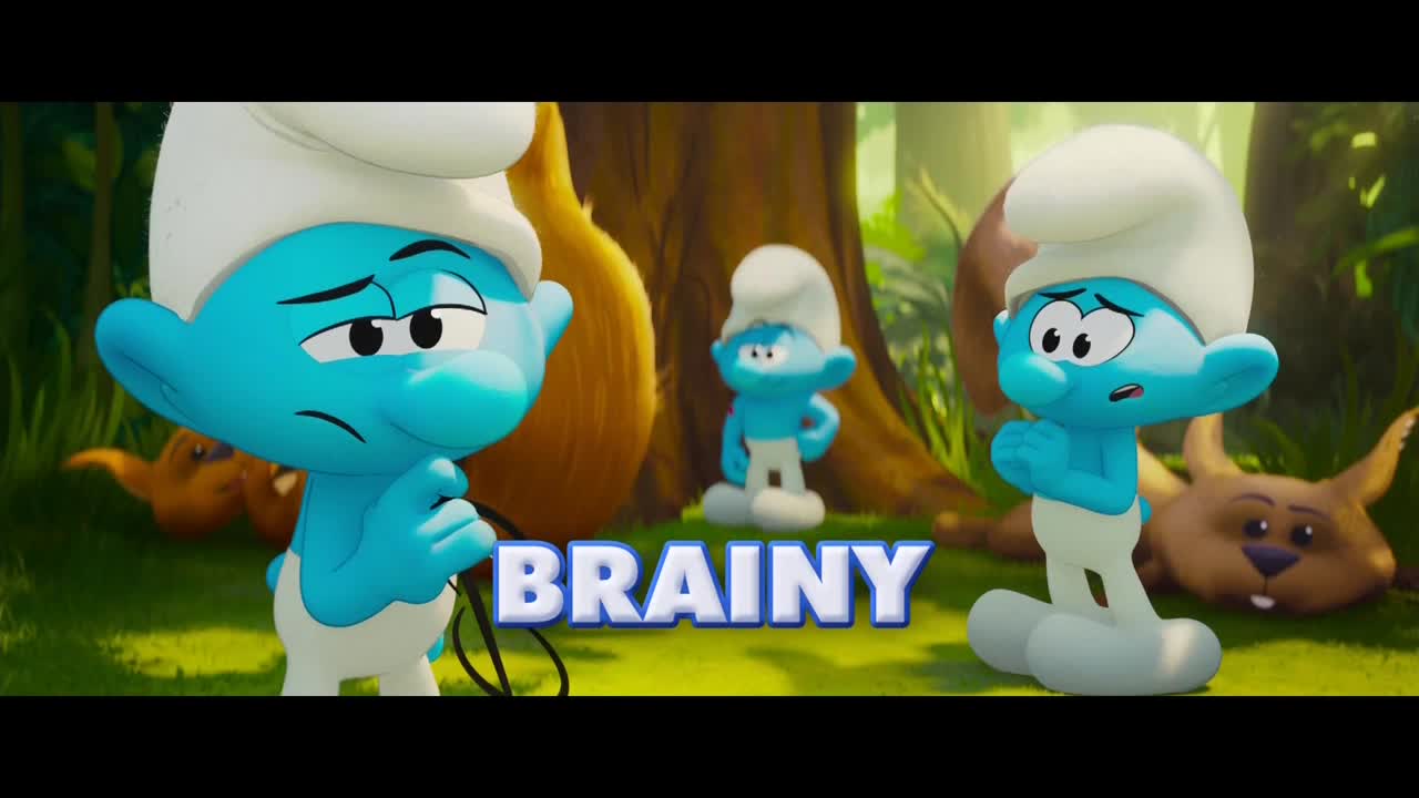 Three blue Smurfs stand in a forest scene, each with worried expressions. The word "BRAINY" is displayed in a large, stylized font at the bottom.

