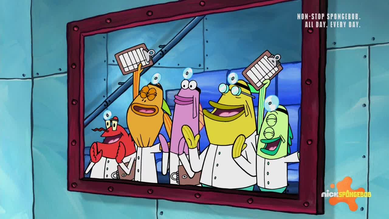 A framed picture shows several cartoon fish in lab coats, each holding up a clipboard. They're smiling, and one wears glasses, all seeming very pleased with something.
