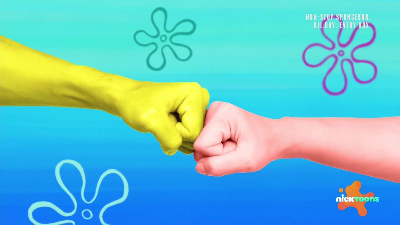A yellow-painted fist bumps a pink one, their knuckles touching. The background is a bright blue, with cartoon starfish floating around.
