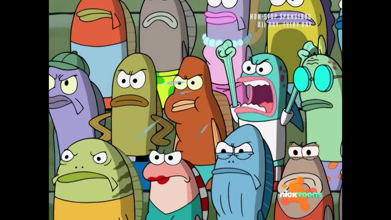 A crowd of fish, all with angry expressions, are packed together. One fish is yelling with its mouth wide open, and another is raising a fist in the air.
