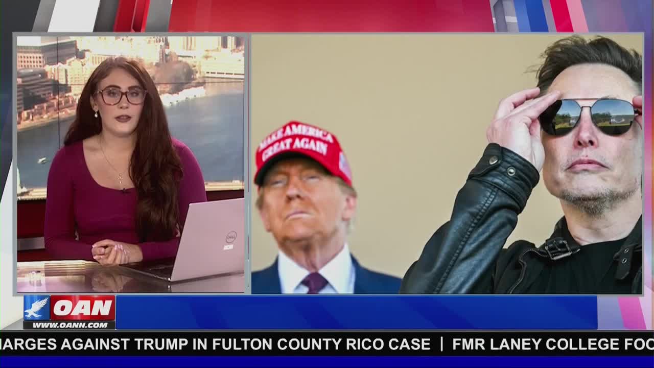 A news anchor from One America News Network sits at a desk in a studio, reporting on a story. Beside her, a split screen shows Donald Trump wearing a "Make America Great Again" hat, and Elon Musk adjusting his sunglasses.
