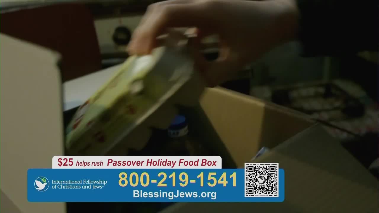 A hand places a box into another, larger one. A graphic overlay announces "$25 helps rush Passover Holiday Food Box" and provides a phone number and website.