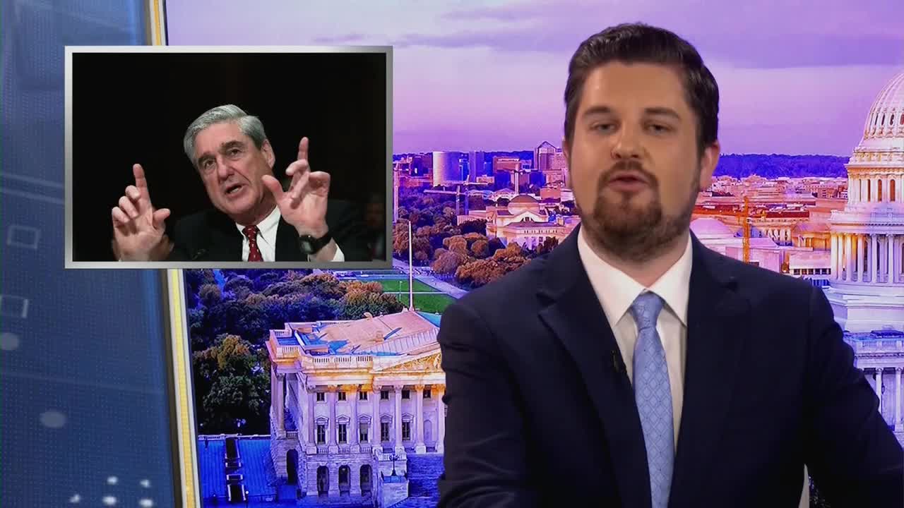 A man in a suit speaks directly to the camera, a smaller screen beside him showing Robert Mueller gesturing with his hands. The backdrop behind them features a nighttime view of Washington D.C. with the Capitol building prominent.