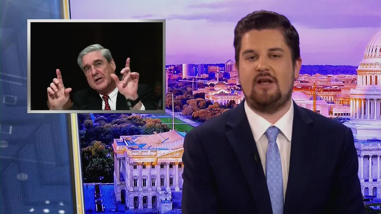 A man in a suit and tie speaks directly to the camera, with a split screen showing Robert Mueller gesturing with his hands. The background displays a nighttime view of Washington D.C. and the Capitol building.