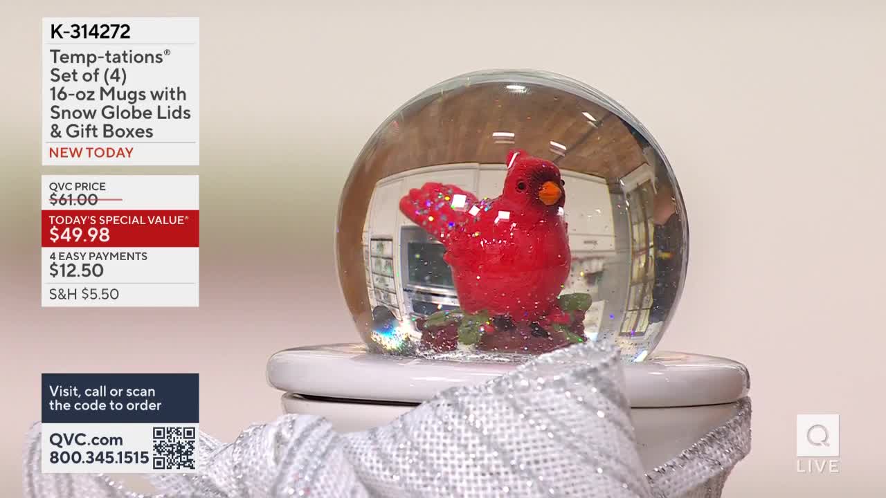 A bright red cardinal sits inside a snow globe, the bird's wing outstretched. The product is being presented on QVC, with a special price of $49.98.
