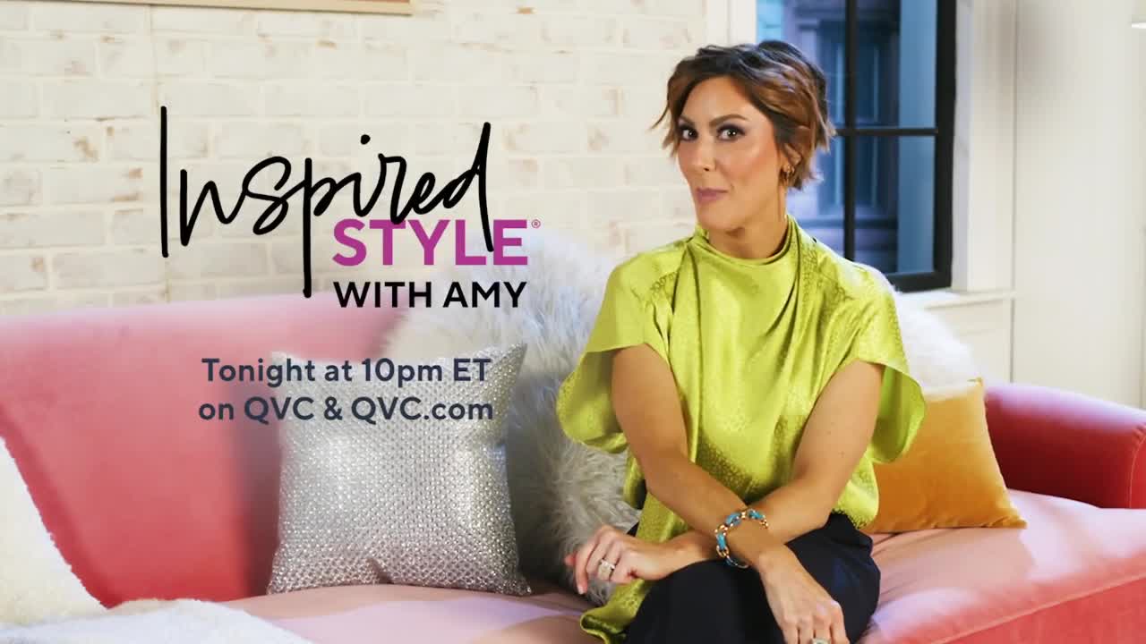 Amy Stran sits on a plush pink sofa, her lime green top catching the light. The text "Inspired Style with Amy" appears on screen, alongside a reminder that the show airs tonight at 10pm ET on QVC and QVC.com.