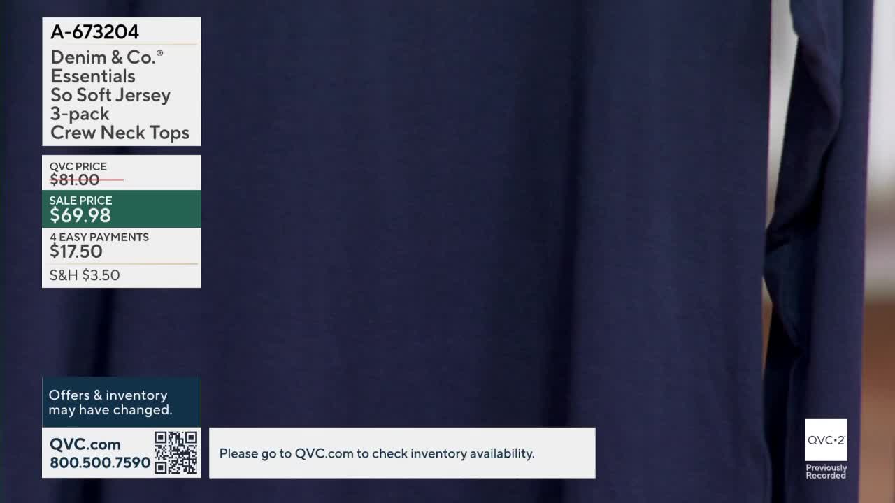 A navy blue long-sleeved shirt is displayed on QVC2. The price and product details are listed in a box to the left.
