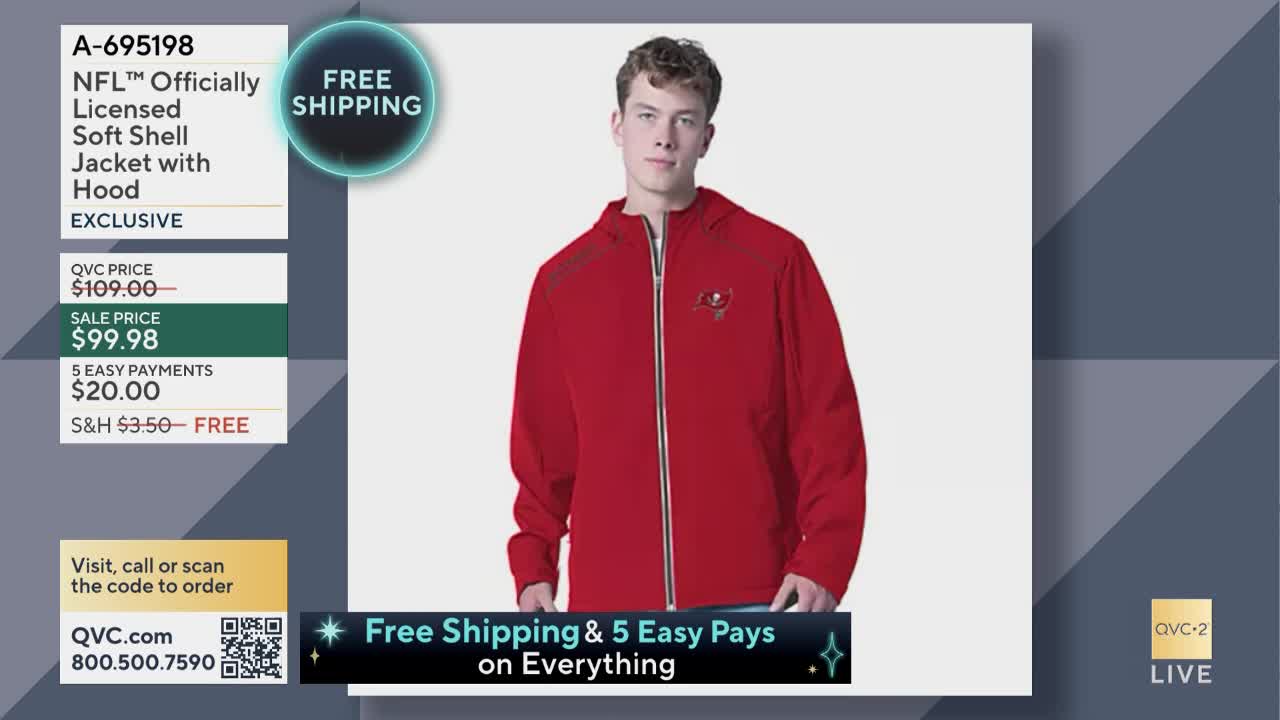A man stands centered, wearing a bright red jacket with a Tampa Bay Buccaneers logo. The QVC2 logo is visible in the corner, and a graphic displays the jacket's price and payment options.
