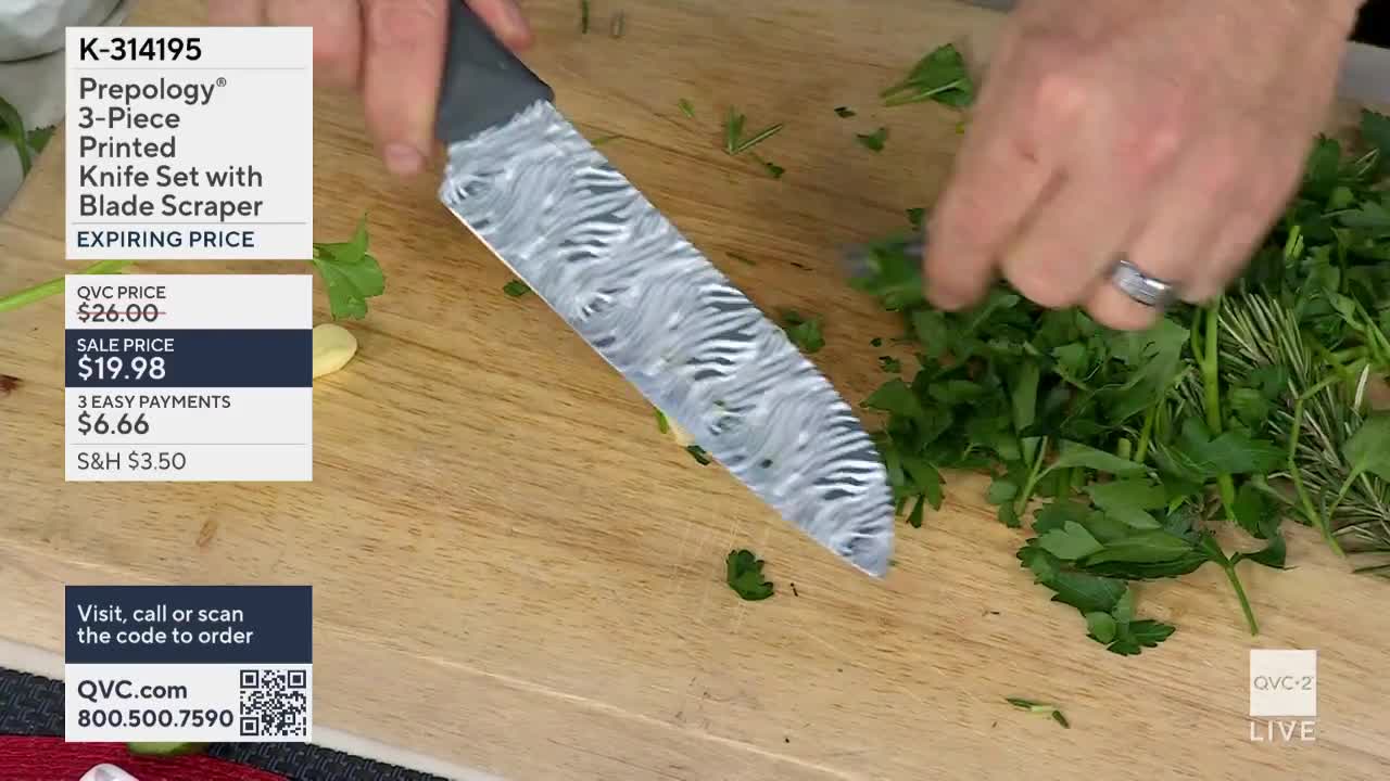 A patterned knife slices through a pile of fresh parsley on a wooden cutting board. Someone's hands are busy chopping, with a sprig of rosemary nearby.