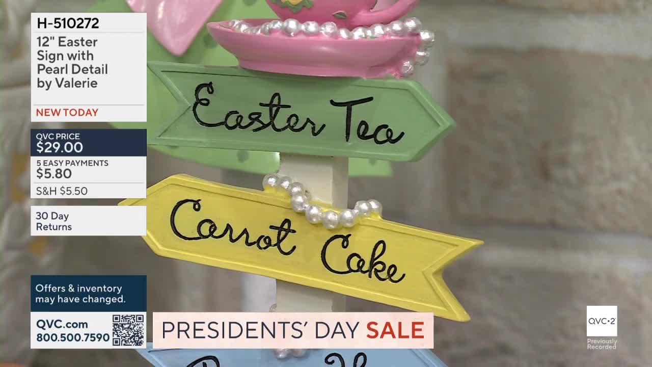 A decorative signpost points the way to "Easter Tea" and "Carrot Cake." Pearls drape across the signs, adding a touch of elegance.
