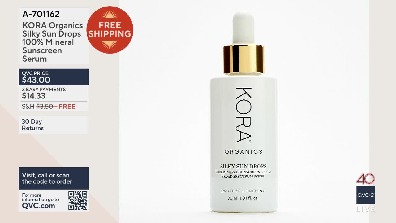 A white bottle of KORA Organics Silky Sun Drops stands on display. The QVC2 logo is visible in the corner.