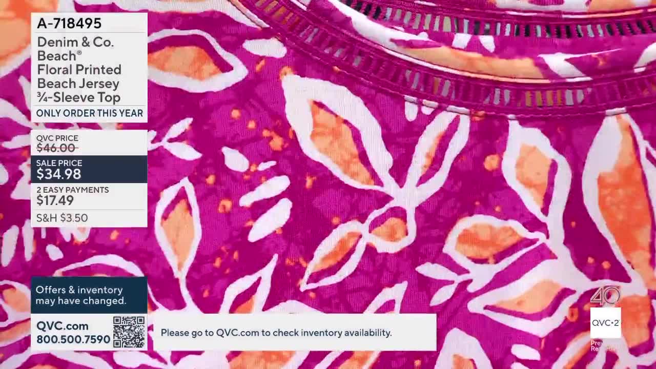 A bright pink top with a bold floral pattern is displayed. The QVC2 logo appears in the corner, indicating this is a product being featured on the channel.