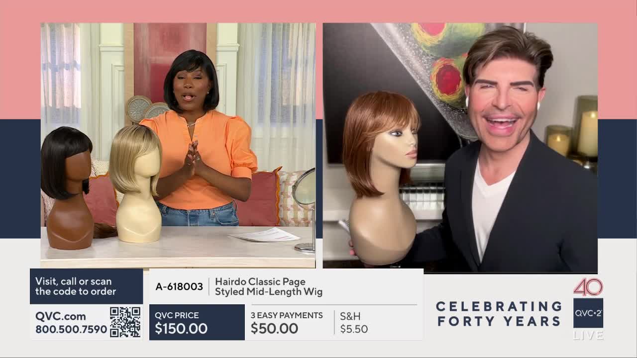 A woman on QVC2 presents two wigs on stands while a man next to a third wig smiles broadly. The screen displays pricing information for a "Hairdo Classic Page Styled Mid-Length Wig."