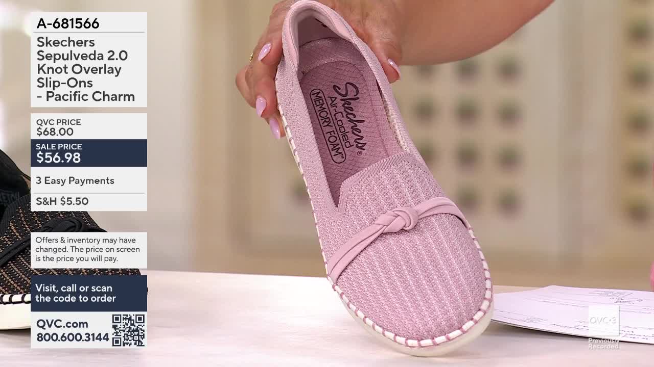 A woman's hand presents a light pink Skechers slip-on shoe, the knot overlay detail clearly visible. The QVC3 price and item number are displayed to the left of the shoe.
