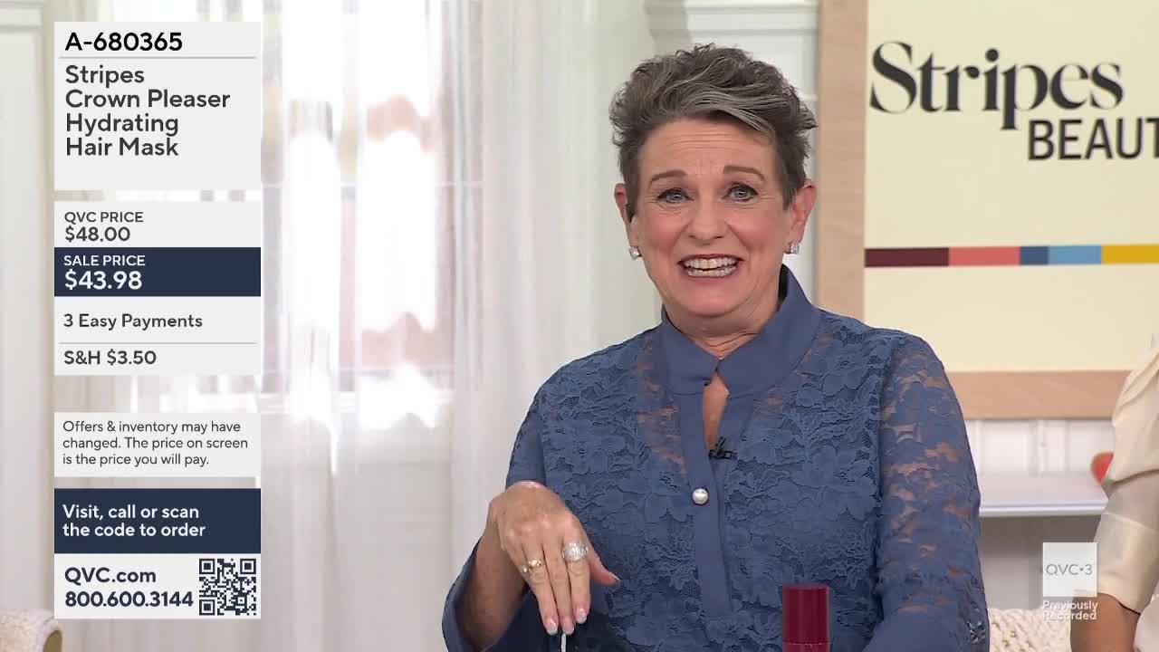 A woman in a blue lace shirt gestures with her right hand while speaking on QVC3. The product information for a "Stripes Crown Pleaser Hydrating Hair Mask" is displayed on the left.
