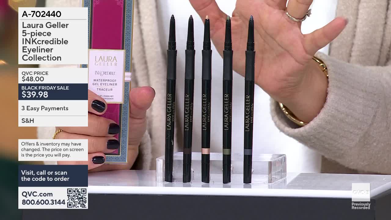 A woman on QVC3 in the United States holds up a Laura Geller eyeliner collection, displaying the five different colored pencils. The Black Friday sale price of $39.98 is clearly visible on the screen.
