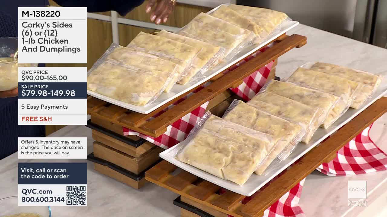 On QVC3, rectangular packages of chicken and dumplings sit on tiered wooden stands. The product is advertised with a price and ordering information on the left.
