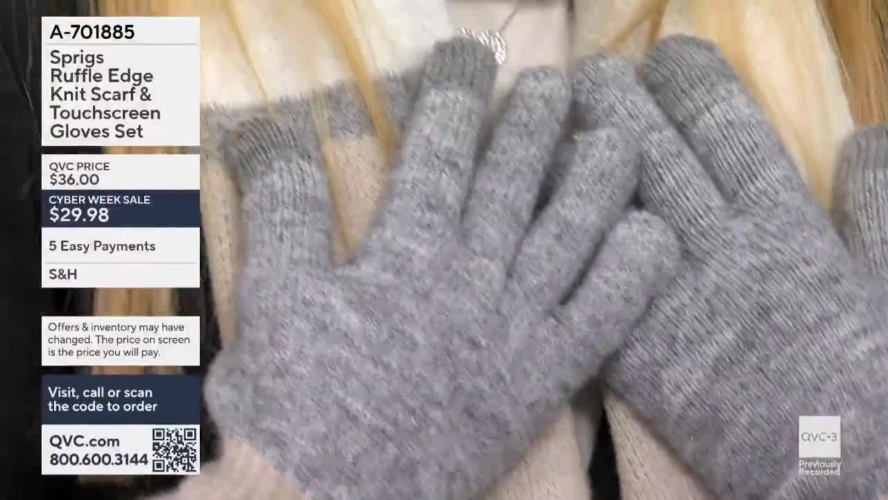 A pair of gray knit gloves, with touchscreen-compatible tips, are displayed on the QVC3 screen. The gloves are part of a set, advertised at a discounted price during a Cyber Week sale.
