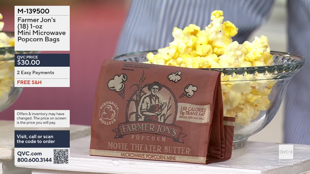 A bowl overflows with freshly popped popcorn, its golden kernels piled high. In front of it sits a brown paper bag, emblazoned with "Farmer Jon's Movie Theater Butter" and a drawing of a farmer.