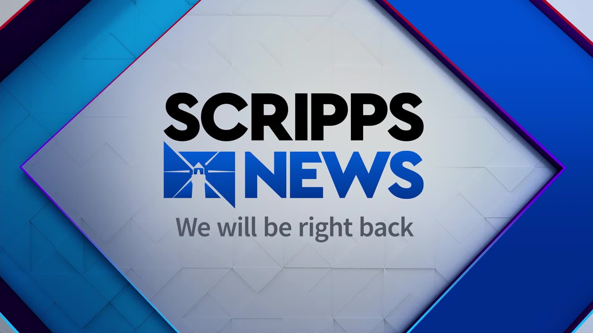The Scripps News logo, in bold black and blue, is centered on a white and blue geometric background. Below, a message promises a return to the broadcast.
