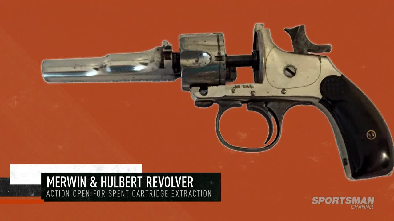 The Merwin & Hulbert revolver is displayed open, its cylinder and barrel separated. The Sportsman Channel logo sits in the corner, the gun's details highlighted against a warm orange backdrop.
