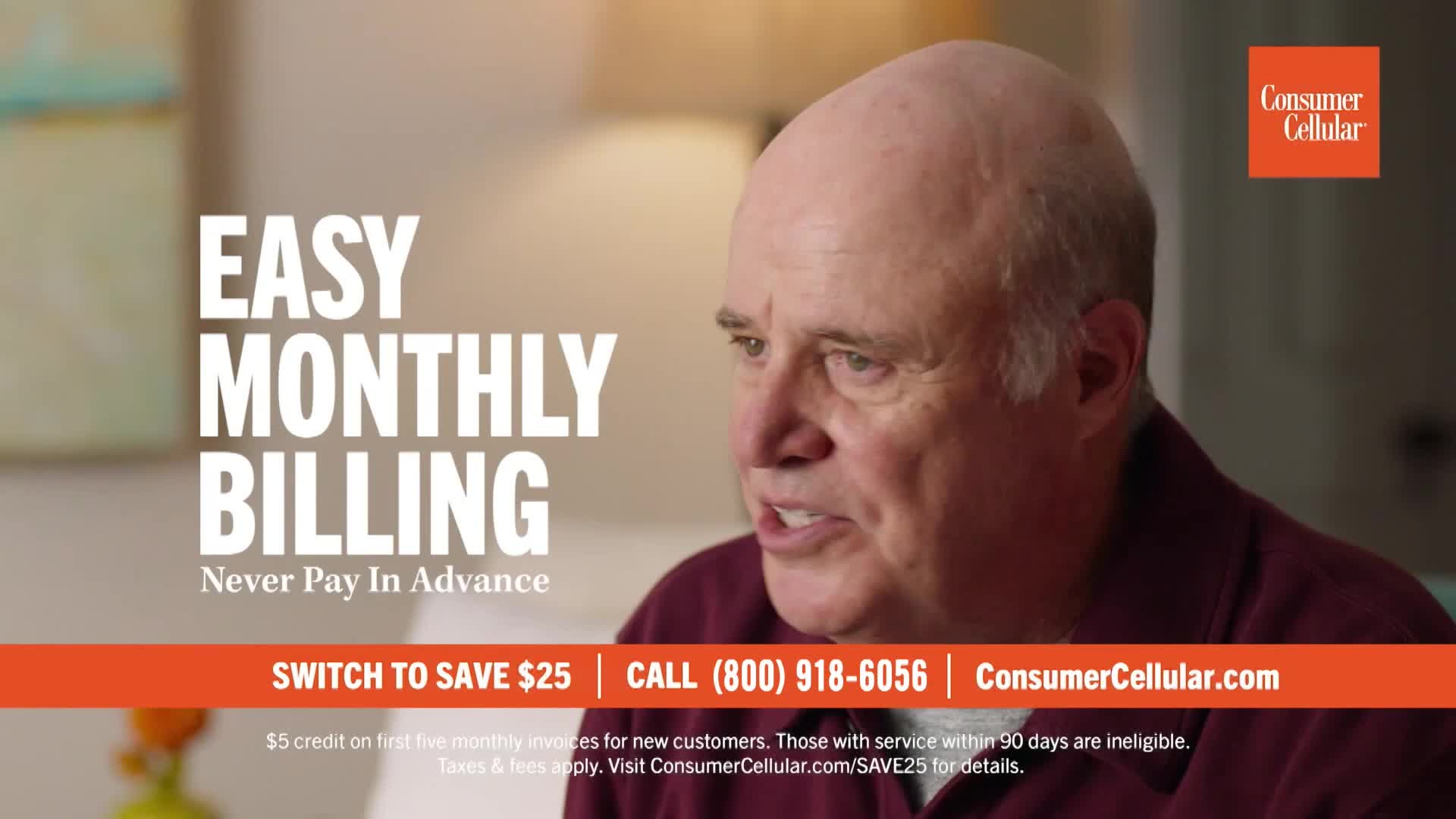 A man with a bald head is speaking, his mouth open as if mid-sentence. The words "EASY MONTHLY BILLING" and a phone number flash on the screen, a common sight on The First TV in the United States.
