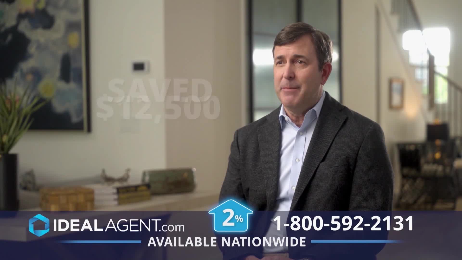 A man in a suit sits in a well-lit room, speaking to the camera. Overlayed text states that someone "saved $12,500" with Ideal Agent, a service available nationwide.
