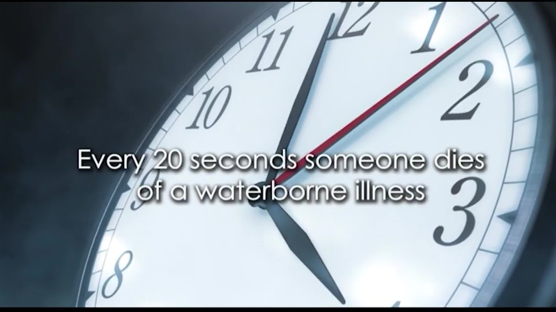 The clock's hands are moving, the red second hand sweeping across the face.  Text appears, reminding me that every 20 seconds, someone dies from a waterborne illness.
