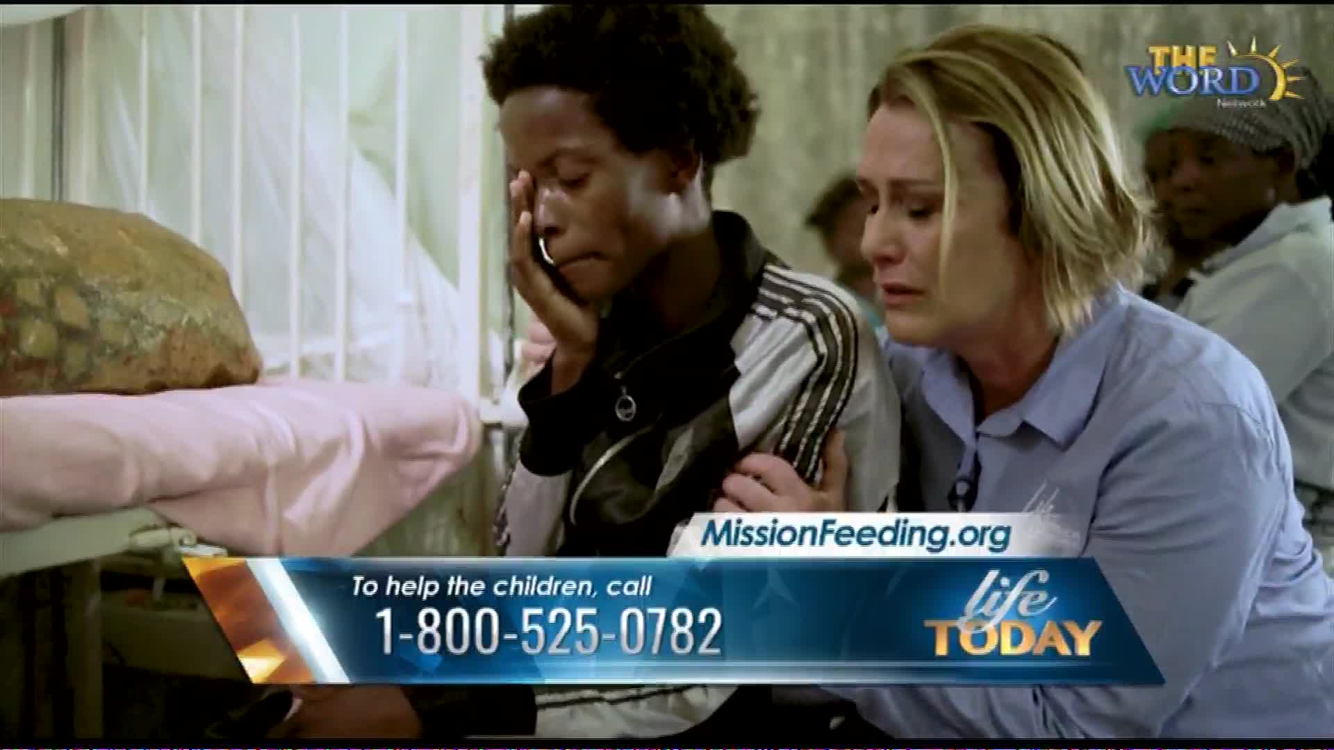 A young person cries, their face buried in their hand, while a woman gently places her arm around them. Another woman stands behind them, her expression somber.