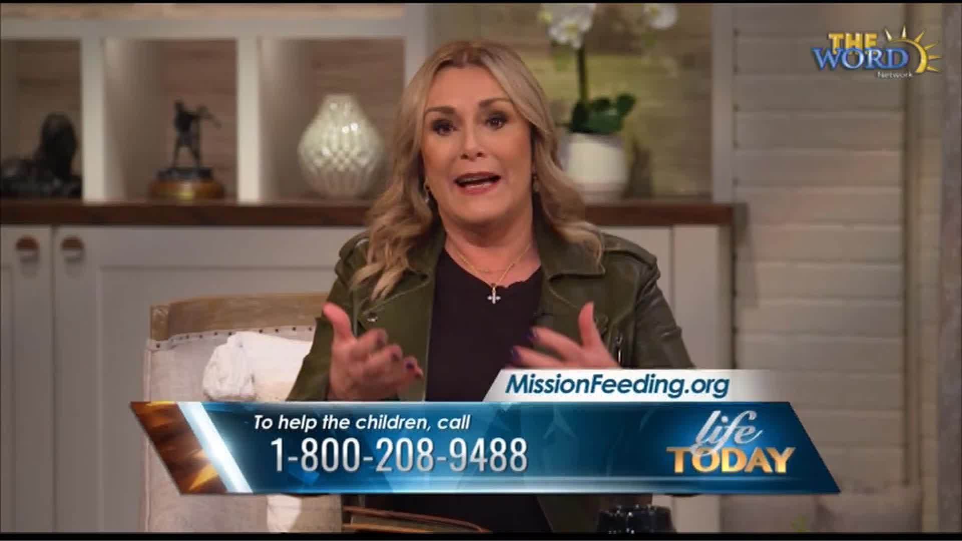 A woman speaks passionately, her hands gesturing as she sits in a chair.  A graphic overlay displays "MissionFeeding.org" and a phone number for "Life Today" on The Word Network.